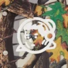 Astro-coachjakke til børn med træcamouflage og Arch Logo Astro-coachjakke til børn med træcamouflage og Arch Logo