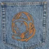 Denimbukser med falmet Arch Logo